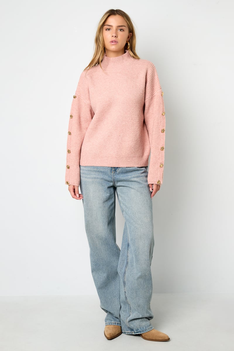 Sweater with buttons on the sleeves