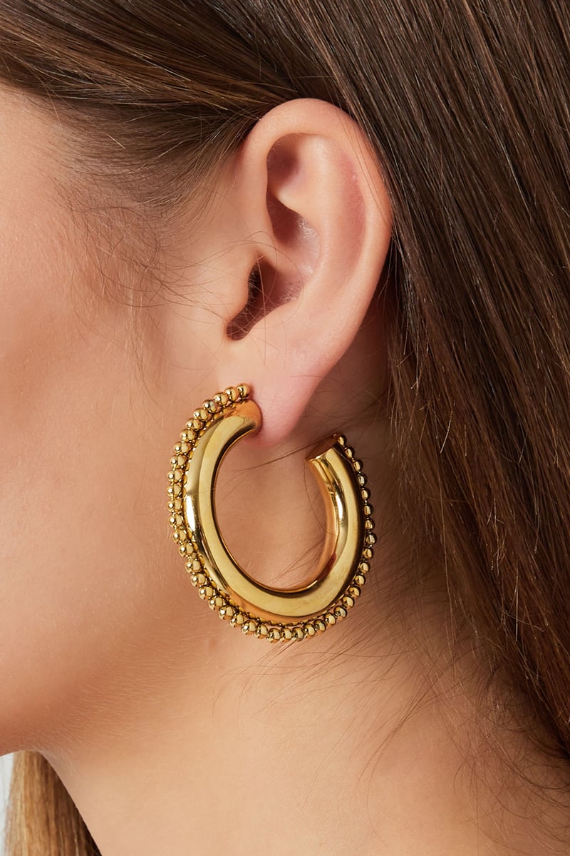 round earrings with dots