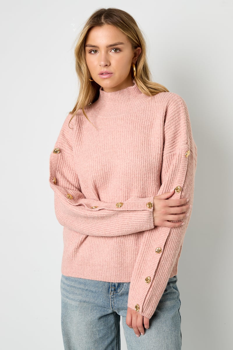 Sweater with buttons on the sleeves
